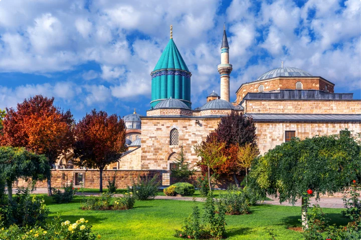 Konya, Türkiye 2 Majestic tomb of Rumi in Konya, Turkey, surrounded by vibrant turquoise tiles and Islamic calligraphy, symbolizing Sufi spirituality and the poet's legacy