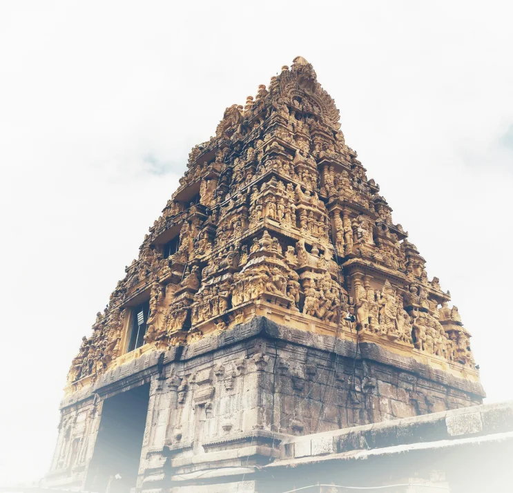 An enchanting view of one of the stunning temples in the Khajuraho temple complex, showcasing its intricate carvings, historic architecture, and spiritual ambiance